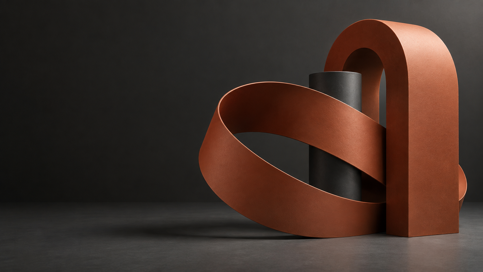 Abstract cedar sculptures against a charcoal background